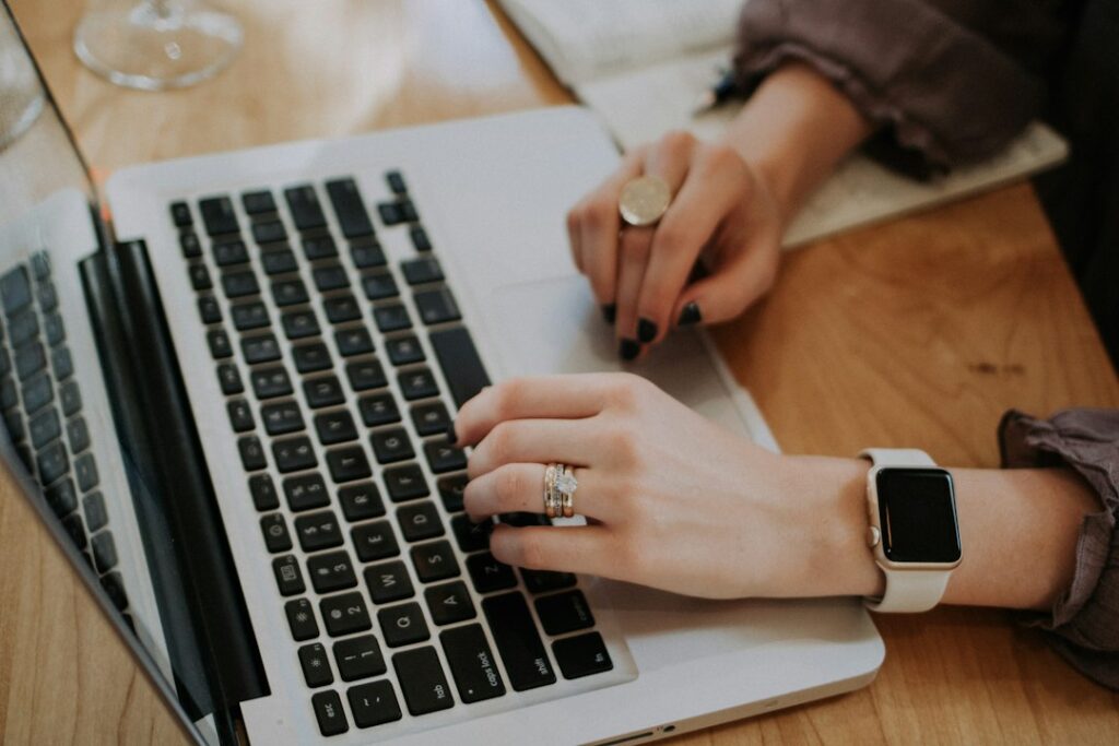 Person using a laptop at a desk